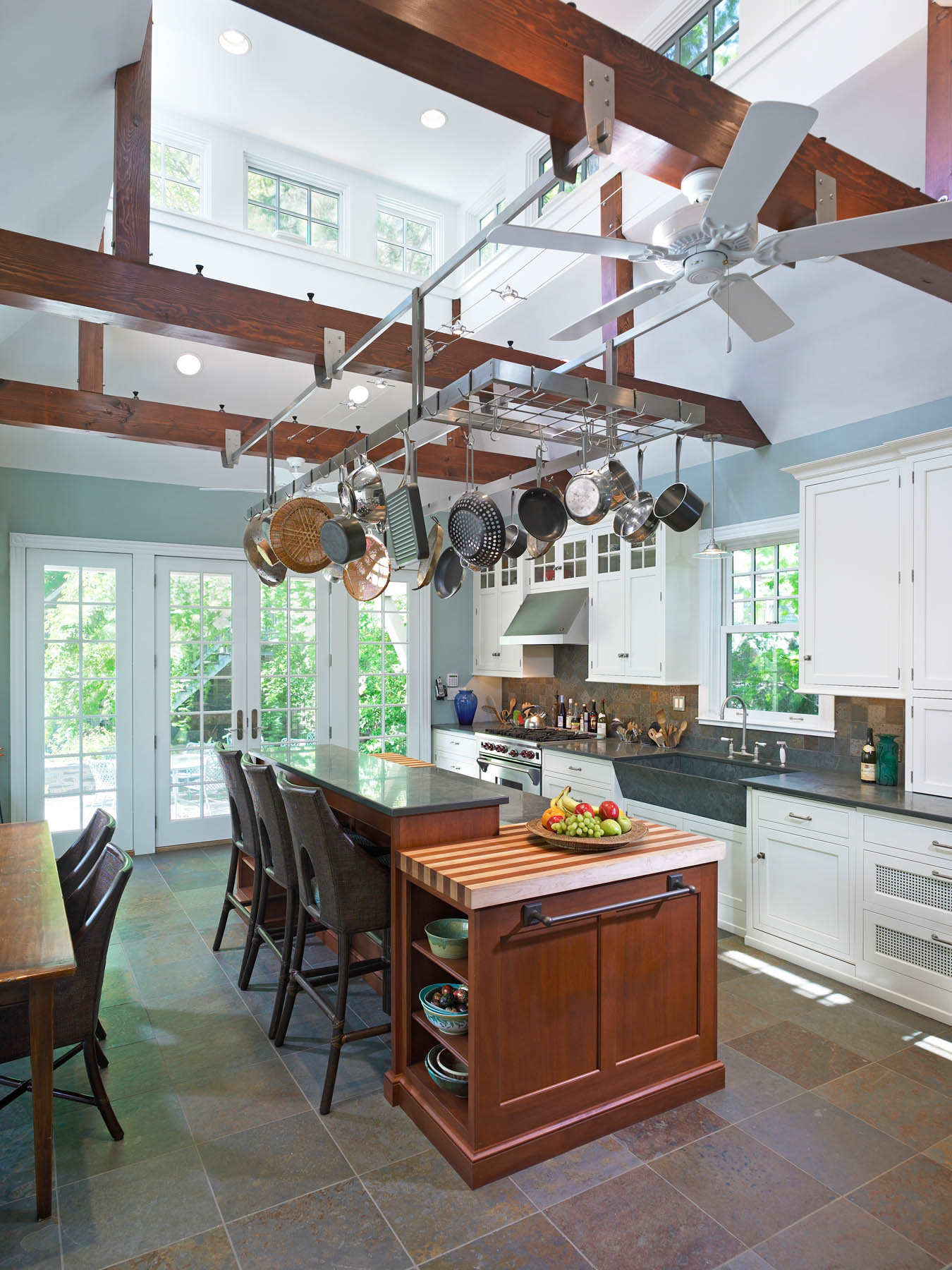 Cottage style kitchen addition with patio